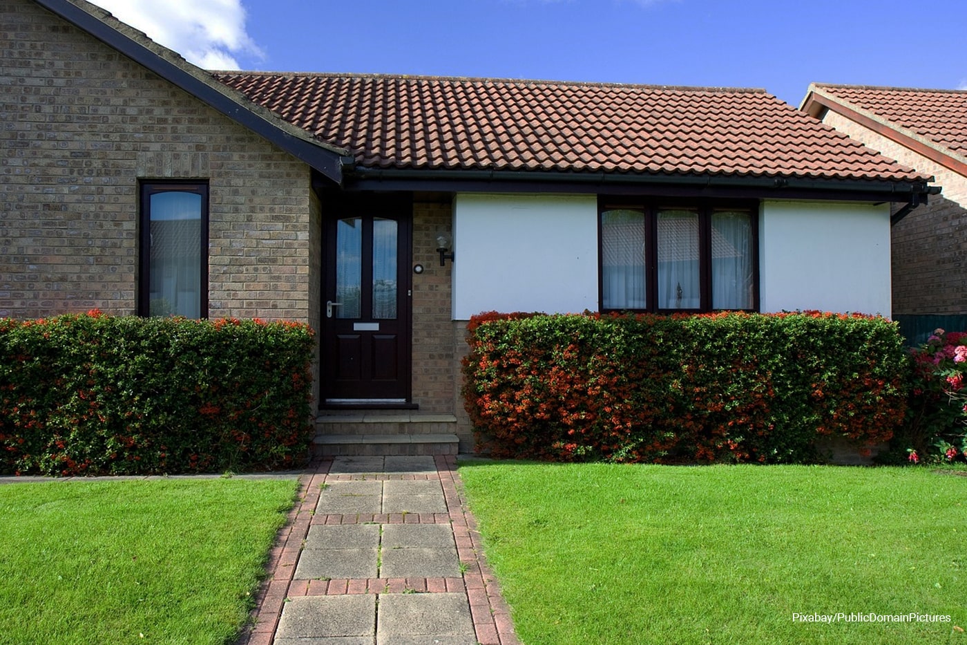 front yard with beautiful lawn