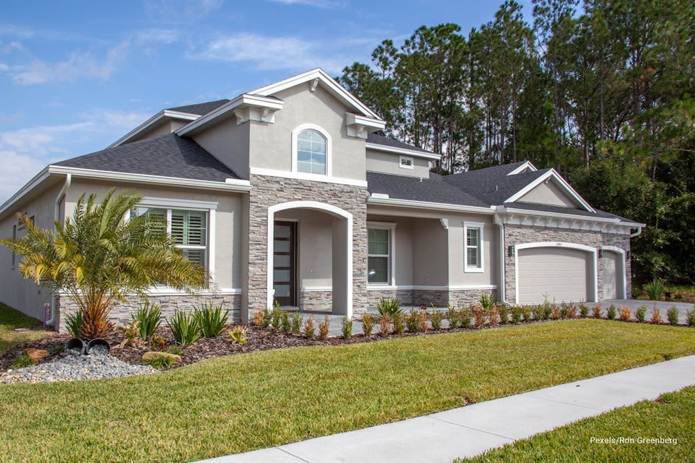 grey house with front yard