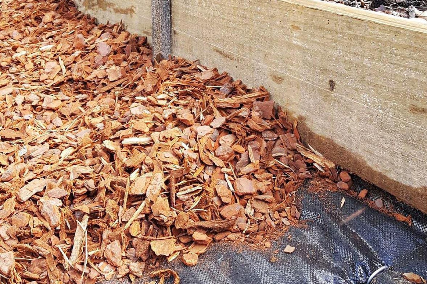 landscape fabric with mulch on top of it