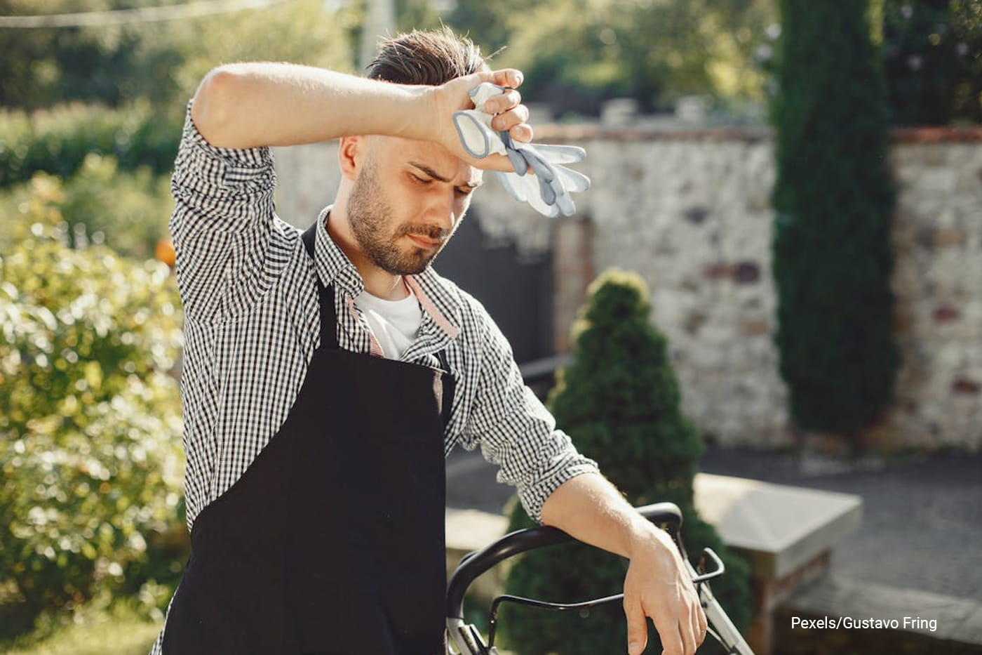 man holding gloves