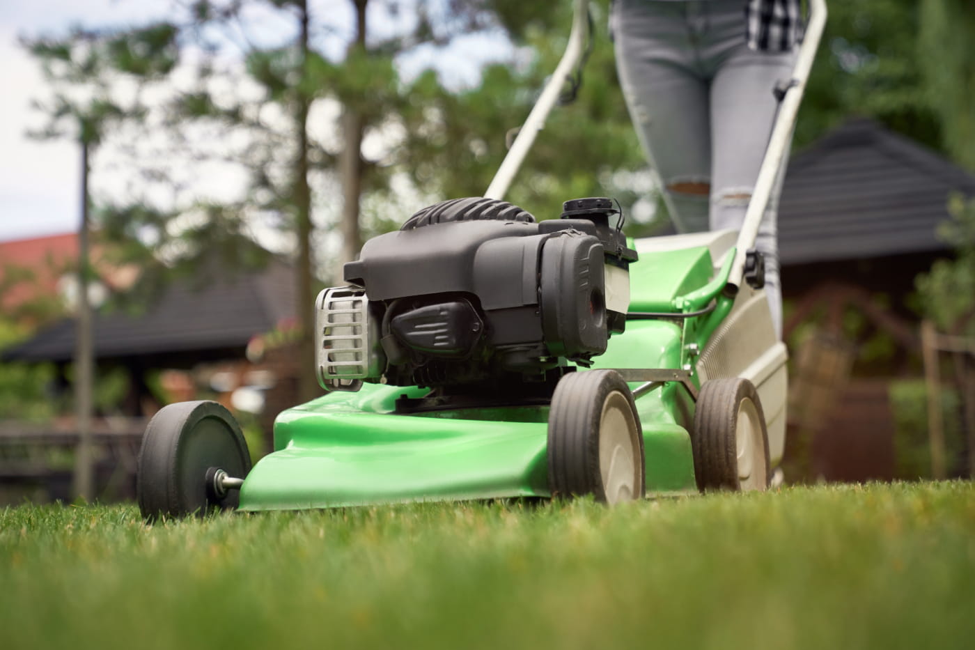 A person using a lawn mower