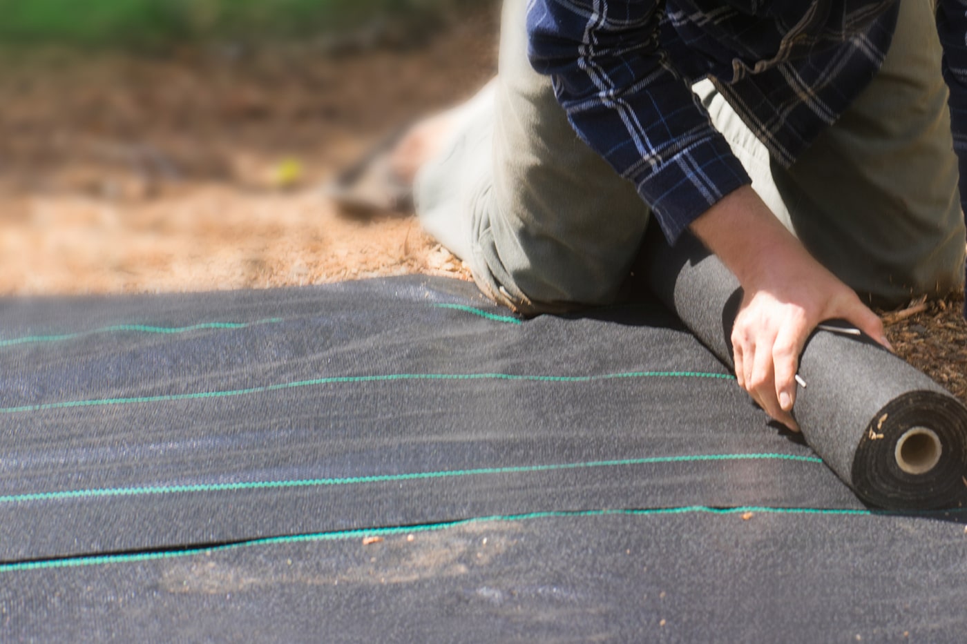 Installing Landscaping Fabric for Weed Control – ECOgardener