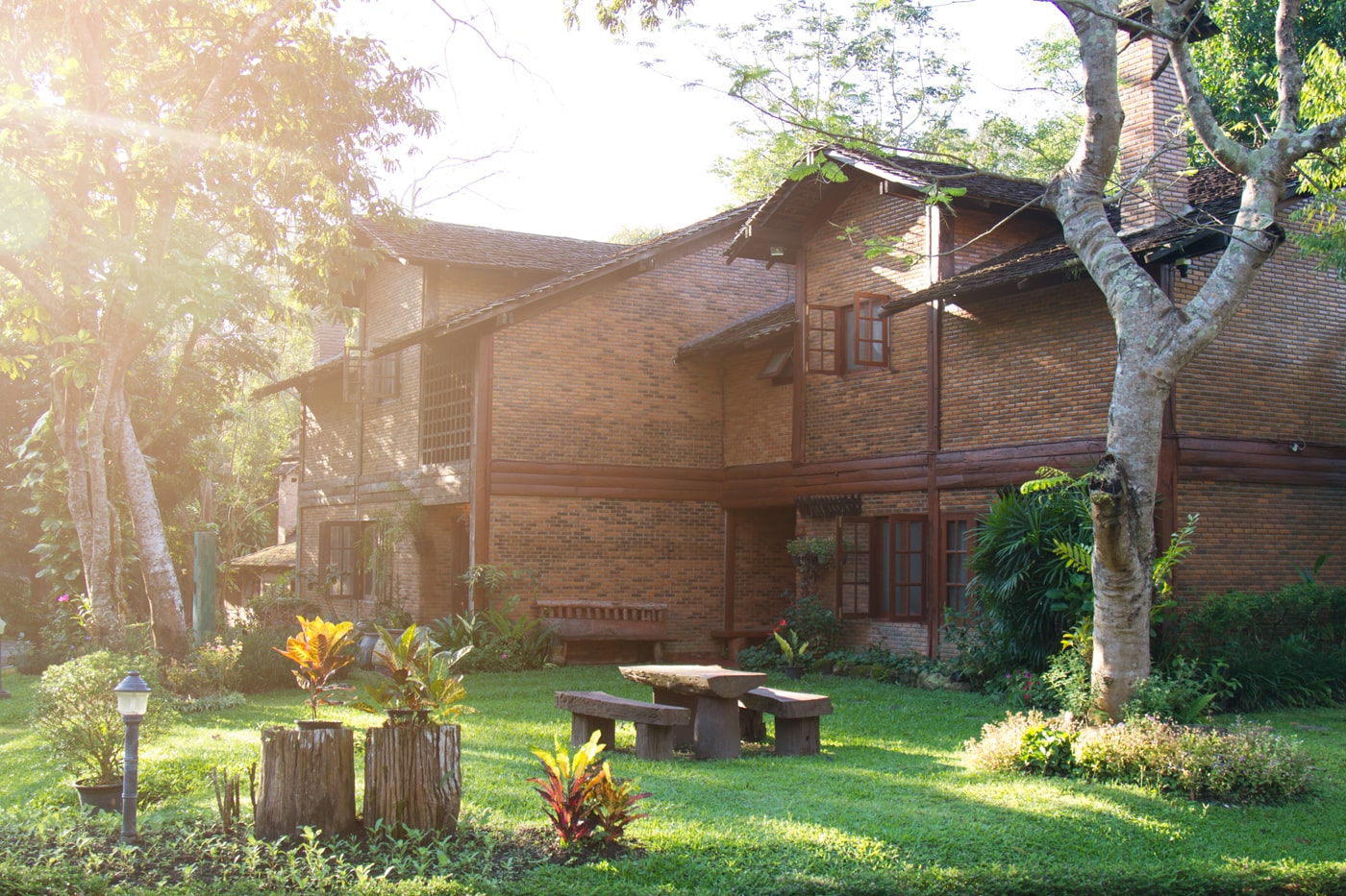 A house with a beautiful green garden.